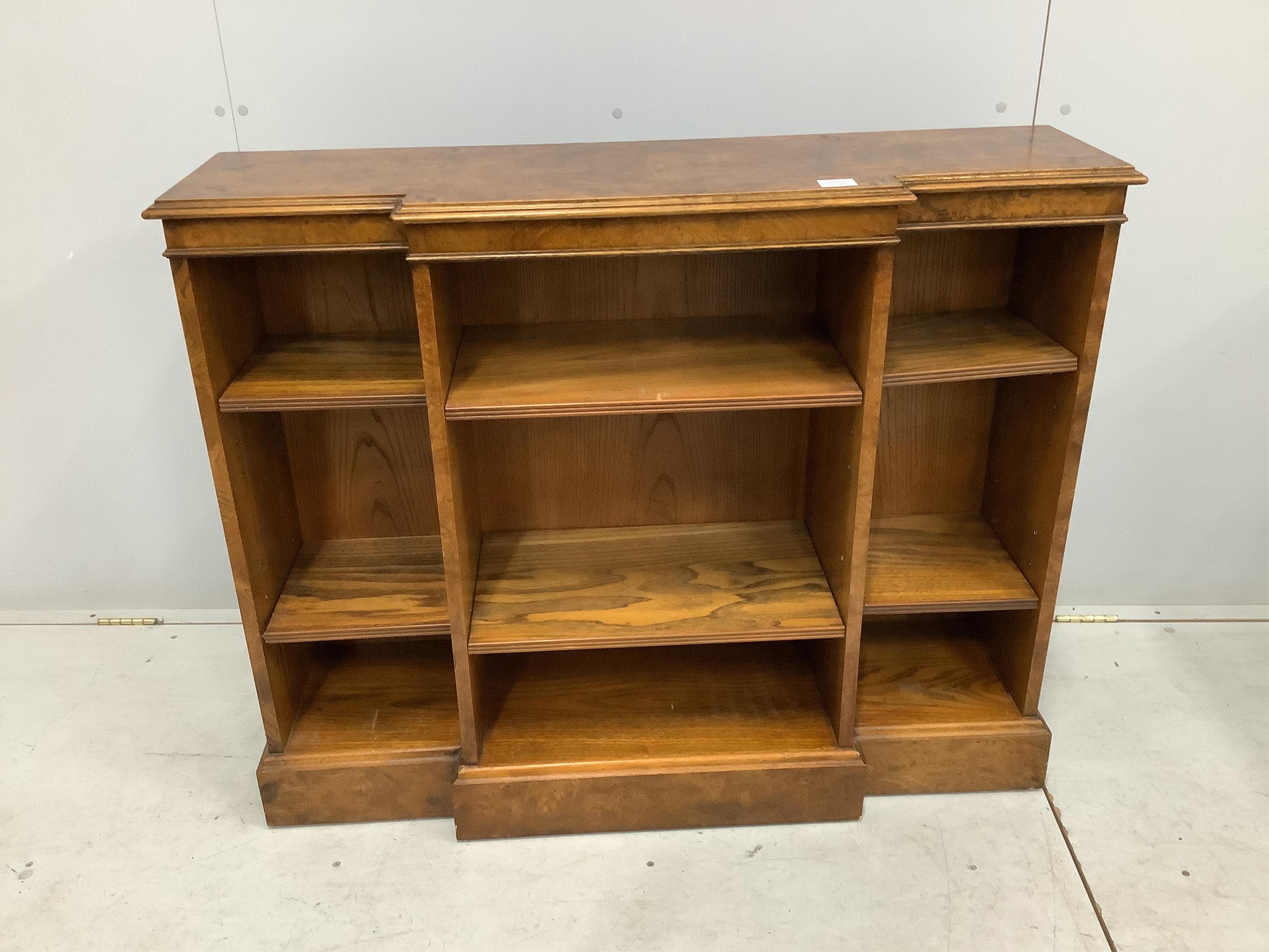 A Regency style banded burr elm dwarf breakfront bookcase, width 112cm, depth 32cm, height 91cm. Condition - good